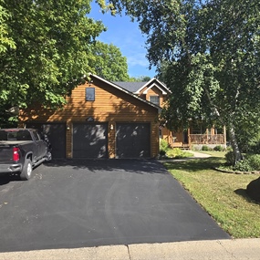 Driveway view of hail damage roof replacement in Prior Lake, MN