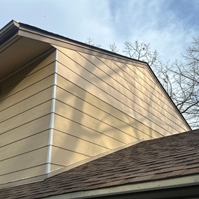 New siding installed along roofline of Prior Lake home